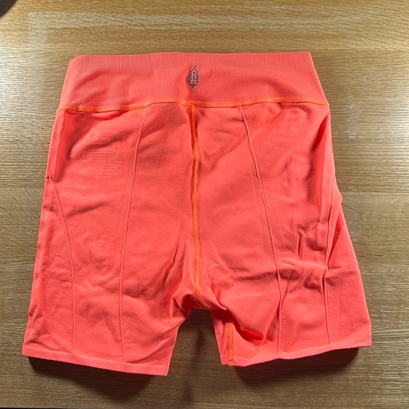 Free People Movement Let’s Go Seamless Bike Shorts Neon Orange Medium - Picture 2 of 3